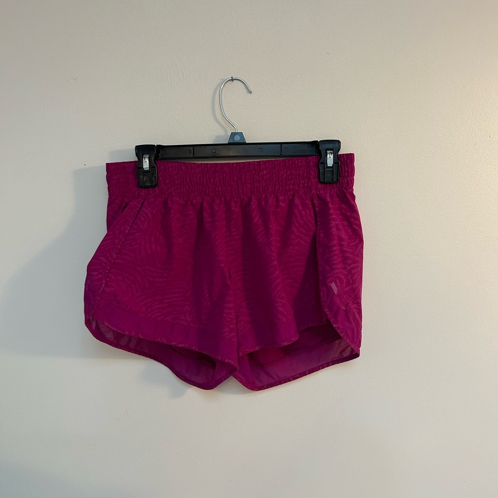 Pink Athleta animal print shorts.
